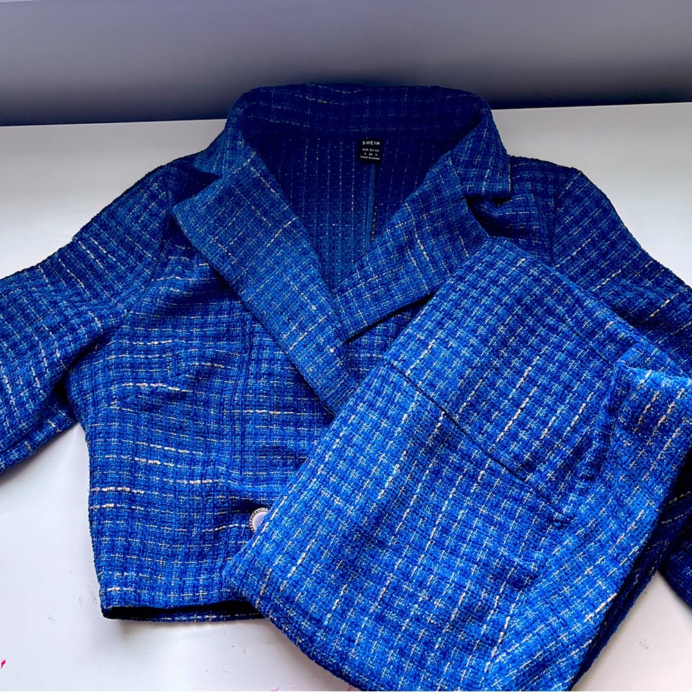Beautiful blue suit that is fitting for all of your business occasions!
